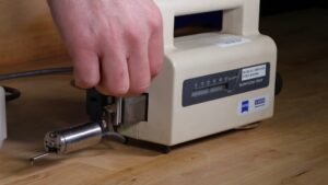 man showing how to use zeiss surfcom 130